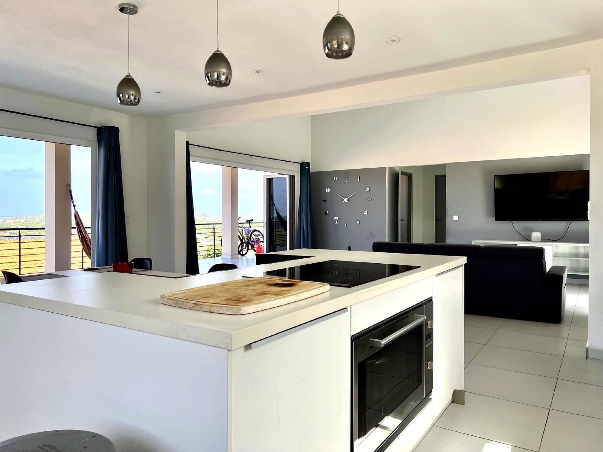 Modern kitchen with island and sea view