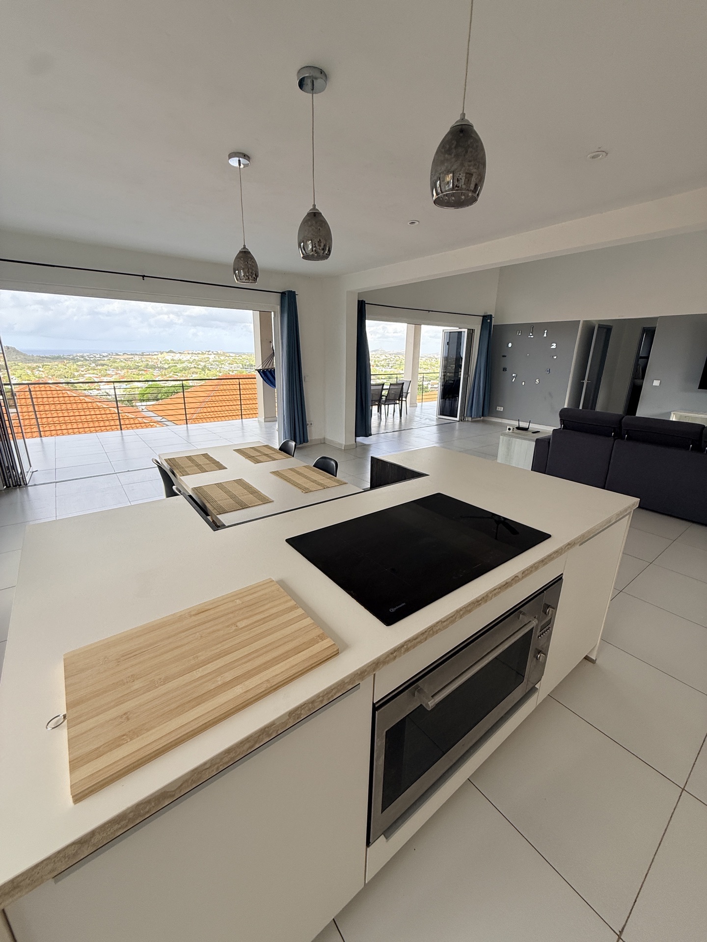 Modern kitchen with island and cooktop